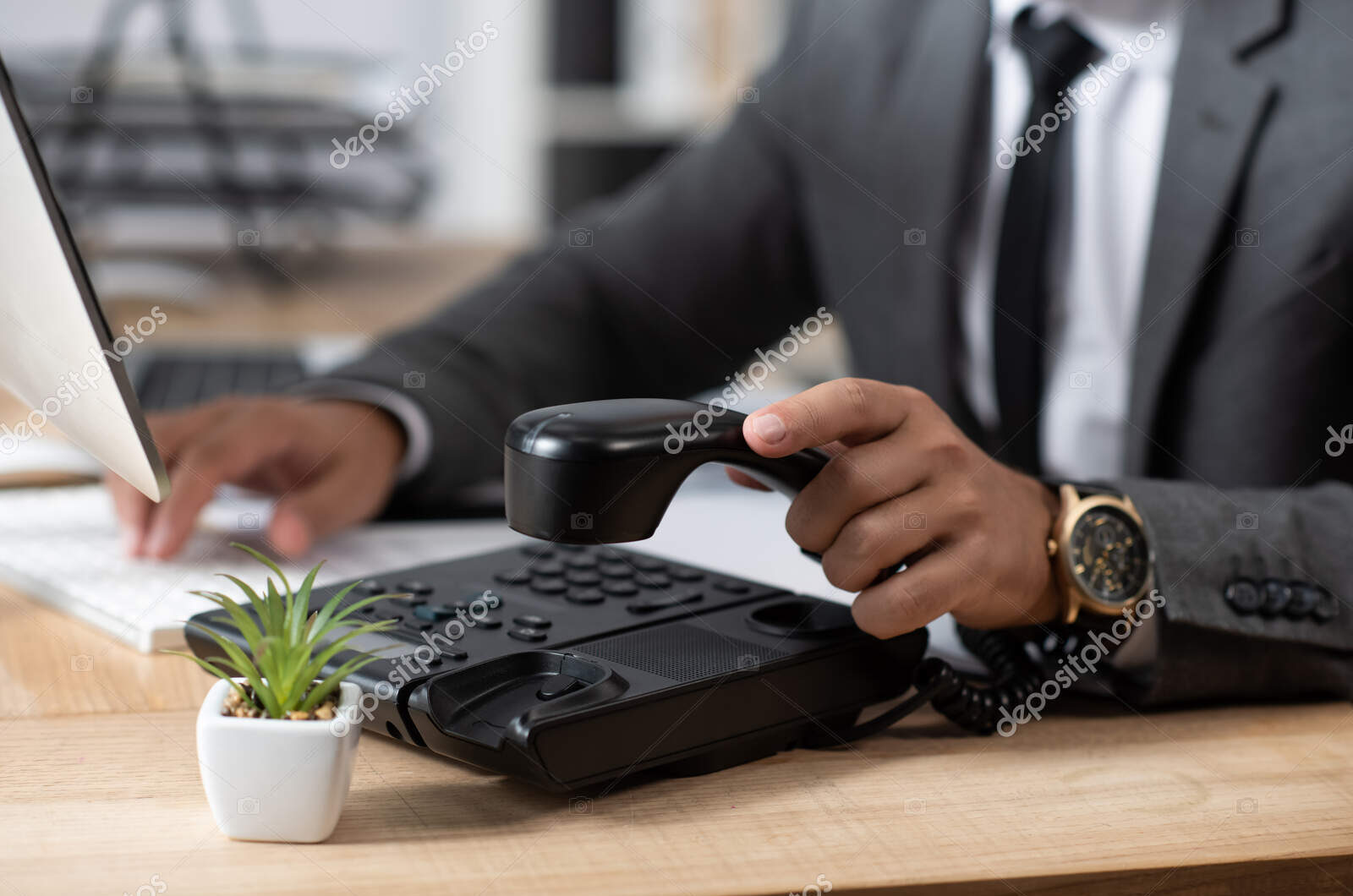 depositphotos 431513478 stock photo partial view trader holding handset